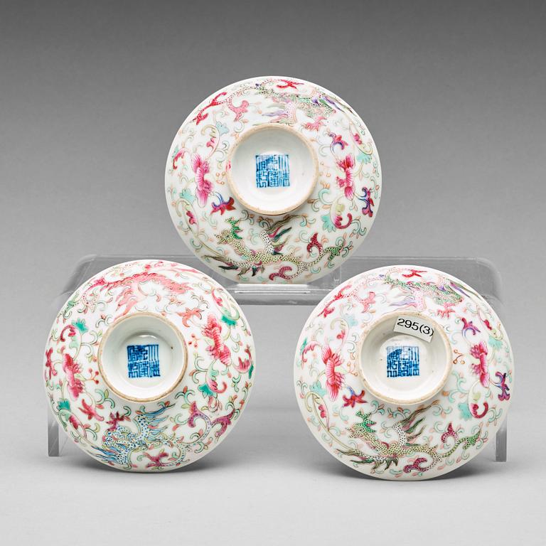 A set of three famille rose covers, Qing dynasty with Qianlong mark.