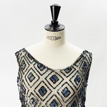 A sequin embroidered 1920's dress.