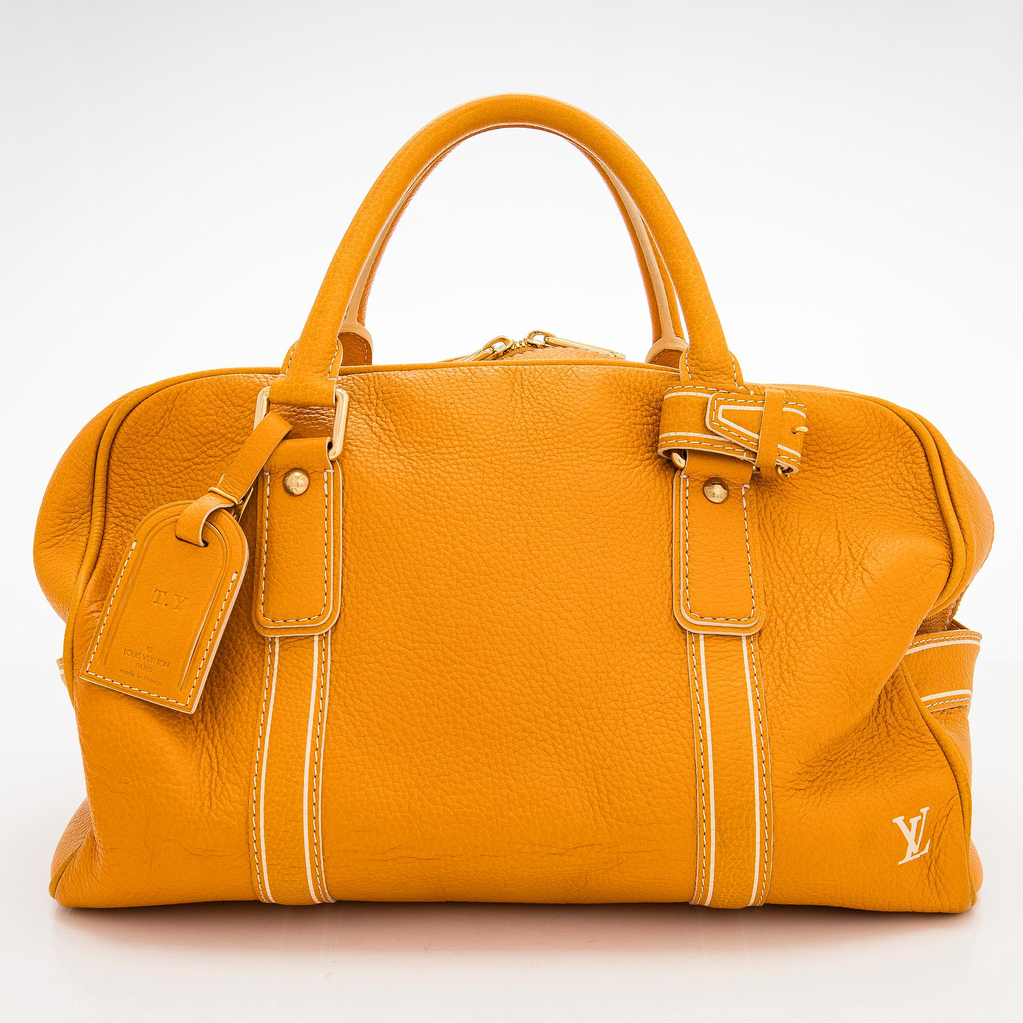 Louis Vuitton, a 'Tobago Carryall' bag.