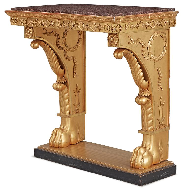 A Swedish Empire 19th century console table with porphyry top.