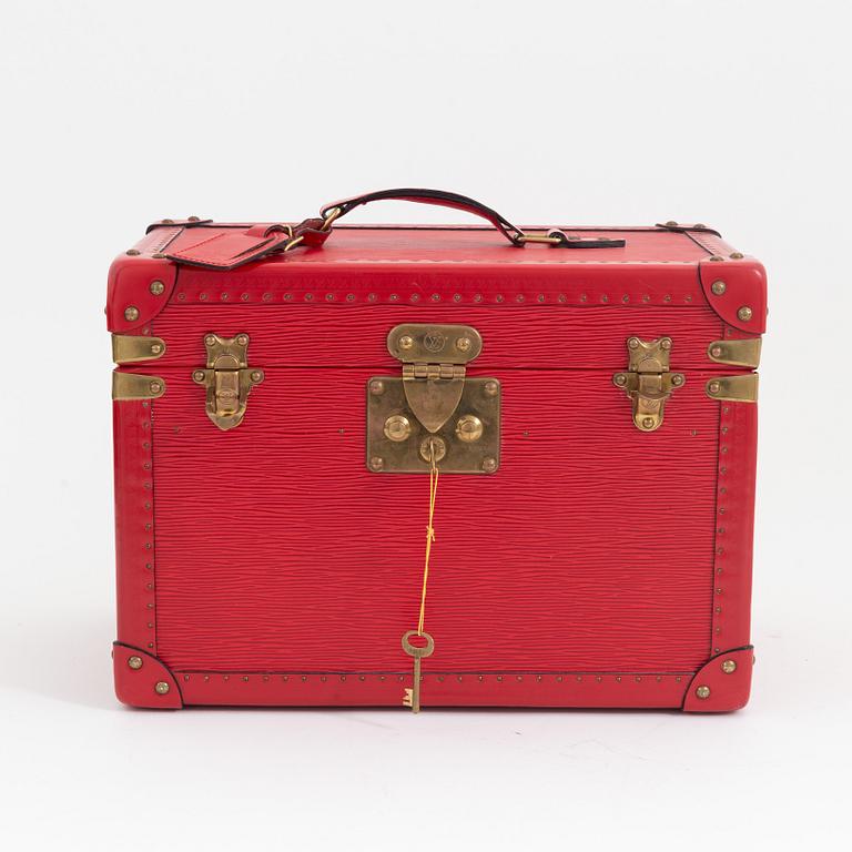 Louis Vuitton, a red Epi beauty box.