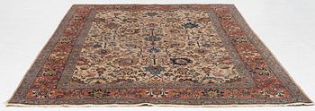 A semi antique Tabriz carpet, c. 290 x 195 cm.