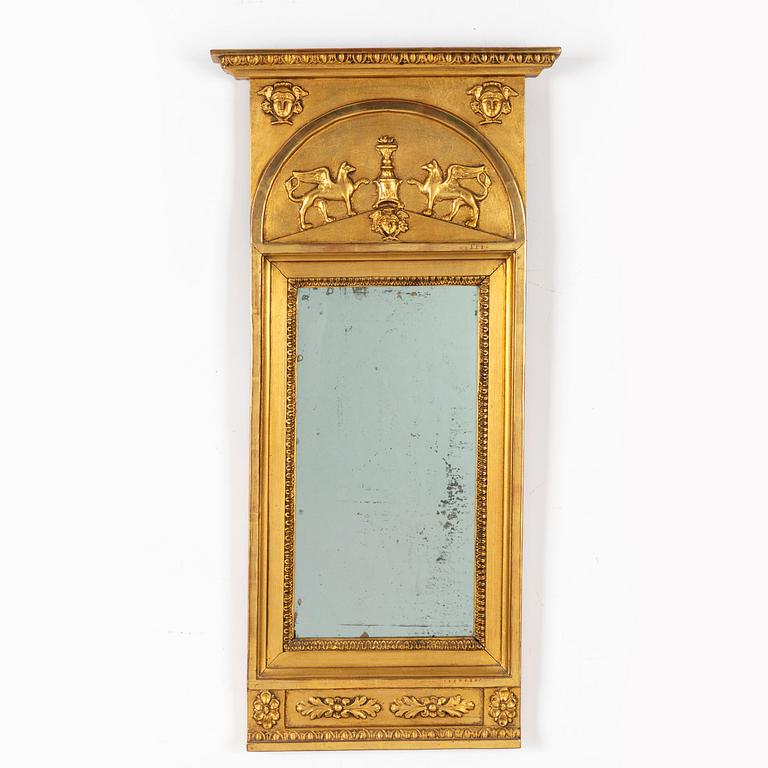 A giltwood Empire mirror by J. P. Holmberg (active in Stockholm 1813 - 1831).