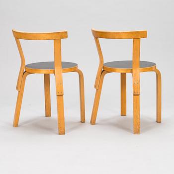 Alvar Aalto, a mid-20th century '81' dining table and four '68' chairs for Artek.