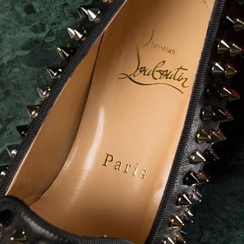 A pair of loafers, "The Rolling Spikes" by CHRISTIAN LOUBOUTIN, in size 38.