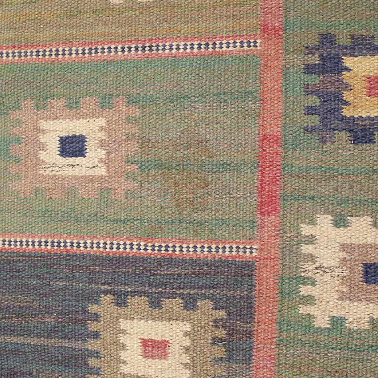 MÄRTA MÅÅS-FJETTERSTRÖM, a flatweave rug, signed AB MMF, 248 x 155 cm.