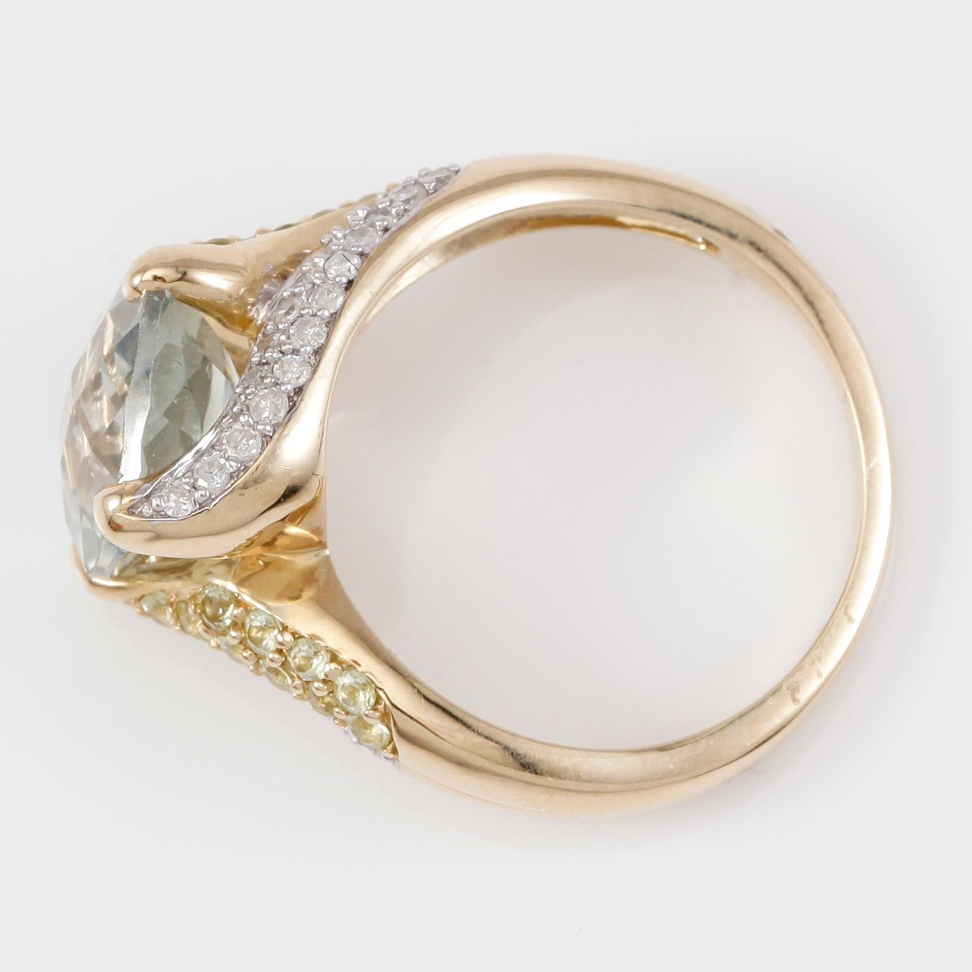 RING, 10K guld, kvarts, peridoter och diamanter tot ca 0.25 ct.