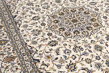 A Keshan carpet, approx. 353 x 251 cm.