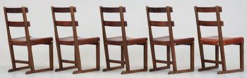 A set of five Axel Einar Hjorth 'Funkis' brown leather and stained wood chairs, Nordiska Kompaniet, Sweden ca 1930.