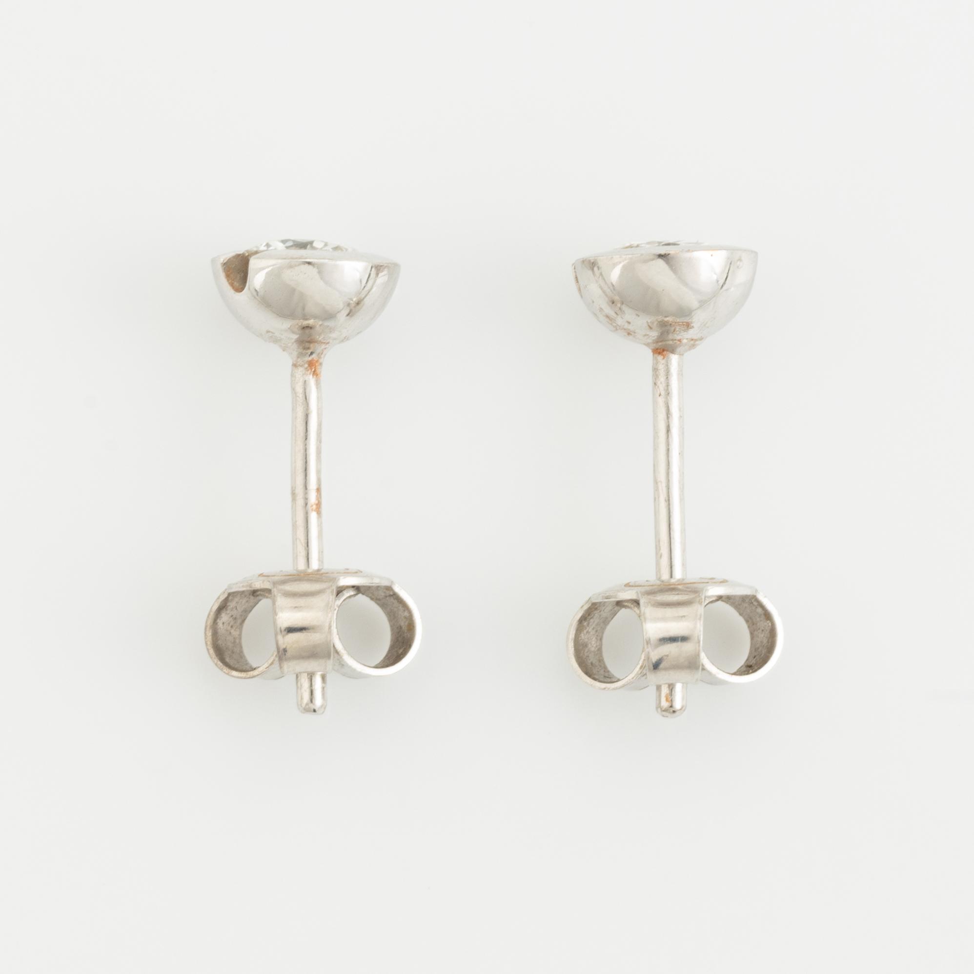 White gold and brilliant cut diamond earrings.