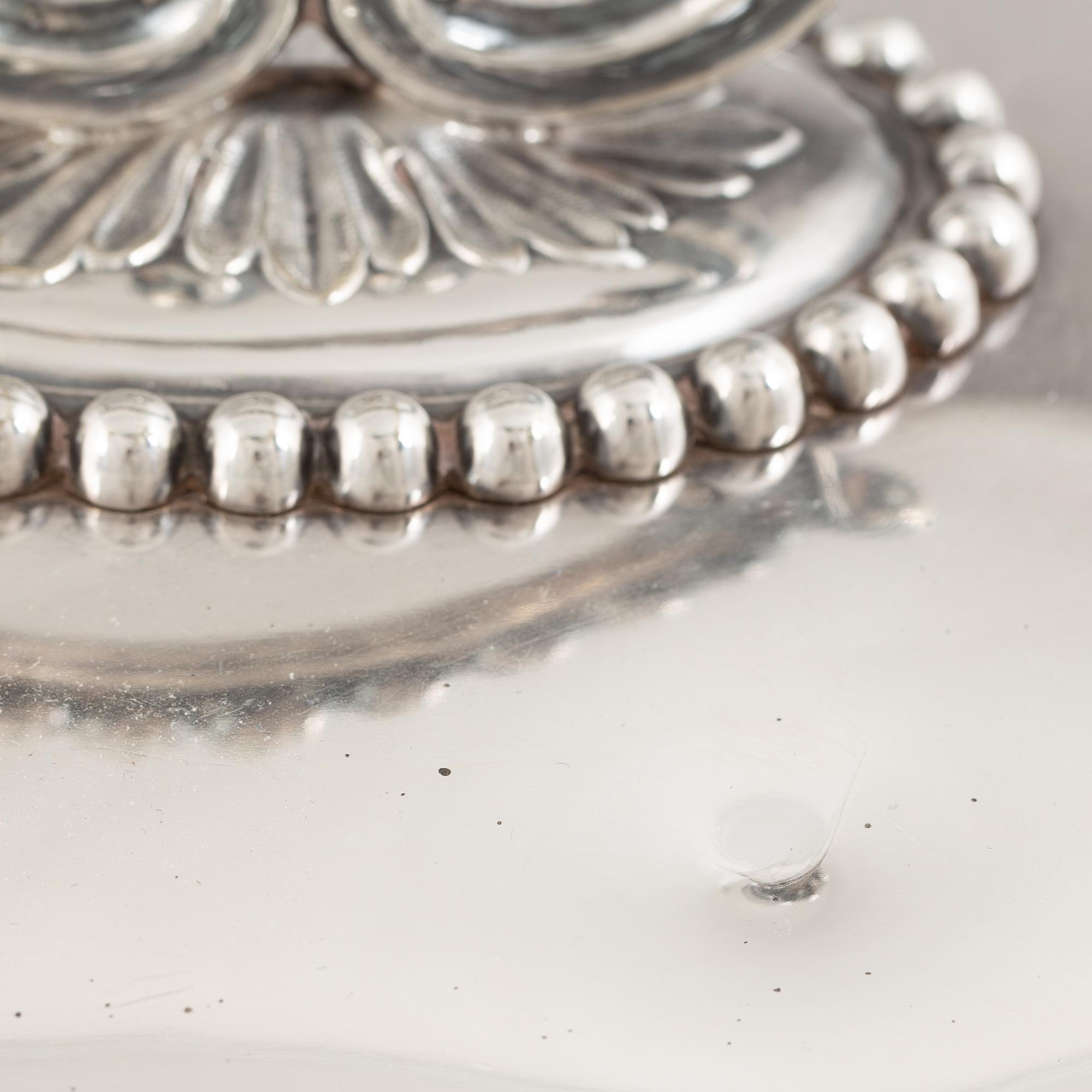 A silver plate food dome cover, Atkin Brothers, Sheffield, England, and a dish, circa 1900.