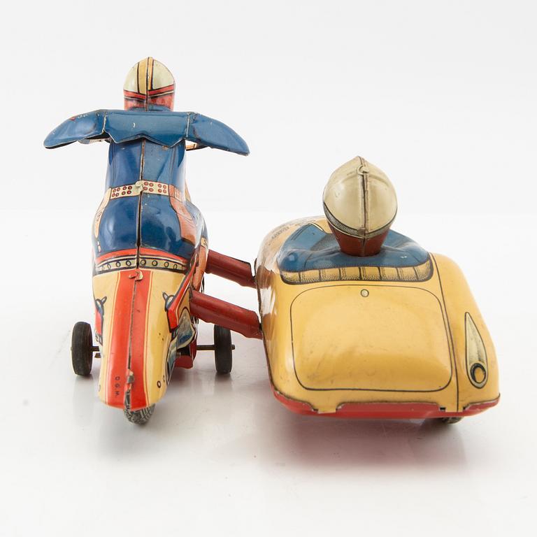 Toy motorcycle with sidecar. Huki Germany mid-20th century lithographed tin.