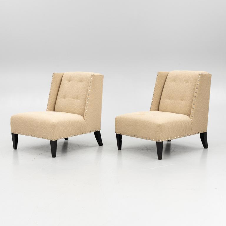 A pair of 'Triton custom chair' lounge chairs, Andrew & Martin, England, 21st century.