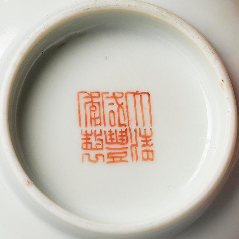 A pair of enamelled landscape dishes, Qing dynasty, seal mark in red Xianfeng (1909-11) and of the period.