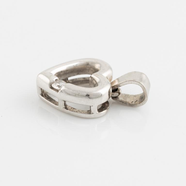 White gold and brilliant cut diamond heart pendant.