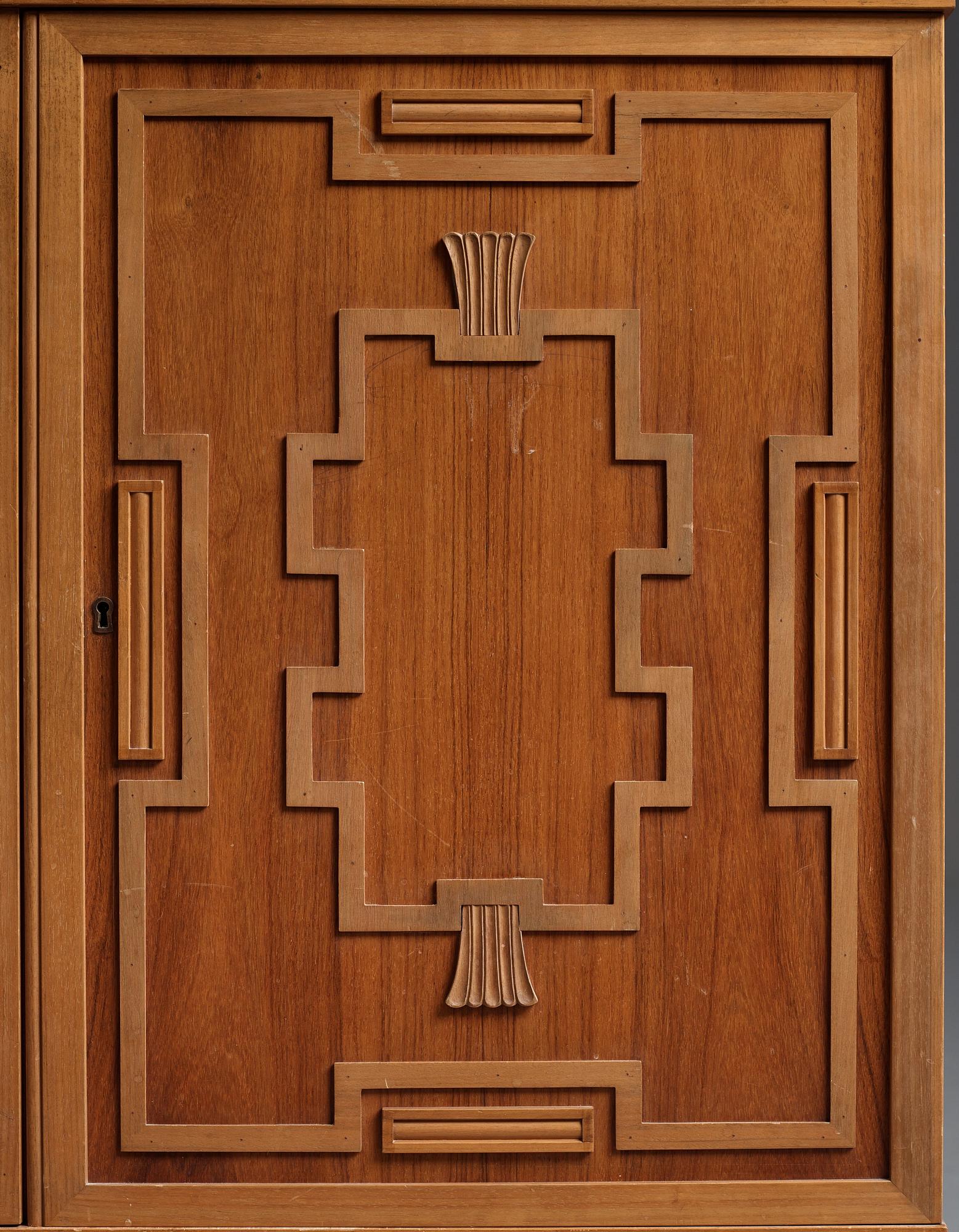 A Swedish Grace mahogany showcase cabinet, reportedly a win at the Stockholm Cabinetmaker's association lottery, 1920's.