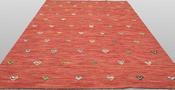 A Kelim carpet, 294 x 207 cm.