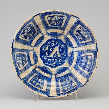 A blue and white persian dish, Qajar dynasty, possibly "Kubachi-ware",