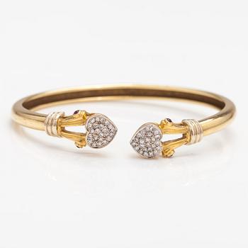 RANNEKORU, 14K kultaa, timantteja n. 0.24 ct yht ja rubiineja.