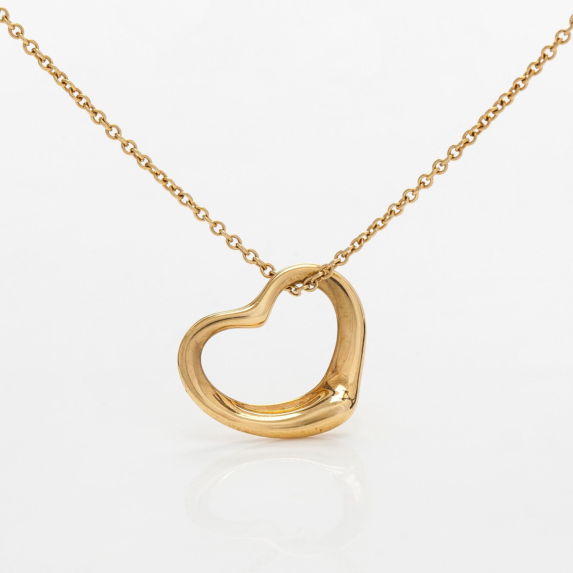 Tiffany & Co, Elsa Peretti, an 18K gold 'Open Heart' necklace.