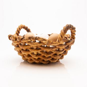 Ingrid Herrlin, basket with eggs, stoneware.
