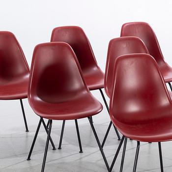 A set of six CHARELS AND RAYE EAMES DSX chairs.