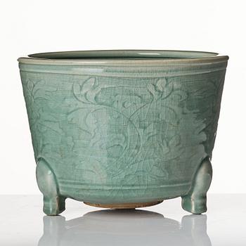 A large celadon tripod censer, Ming dynasty (1368-1644).