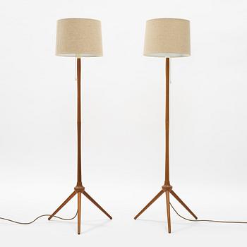 A pair of teak floor lamps, mid 20th century.