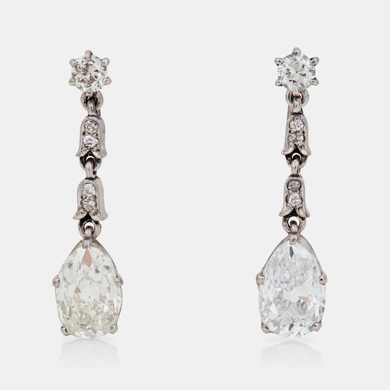 A pair of pear shaped and brilliant-cut diamond earrings. Made by Swedish court jeweller W.A. Bolin, Stockholm 1953.