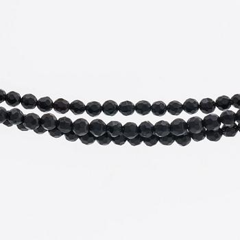 LYNGGAARD, clasp 18K whitegold w 3 brilliant-cut diamonds, 1 row cultured peals and aquamarines, 3 rows of onyx beads.