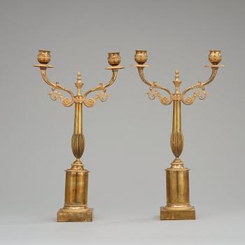 A pair of Swedish Empire early 19th century two-light candelabra.