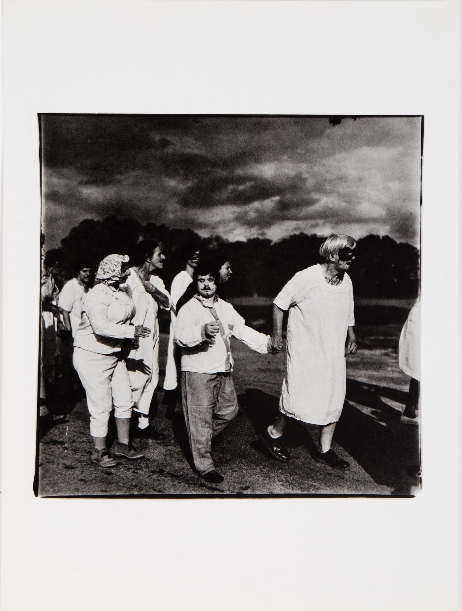 DIANE ARBUS, Portfolio with 12 heliogravures published by Electa in 1979. Numbered 26/1000.