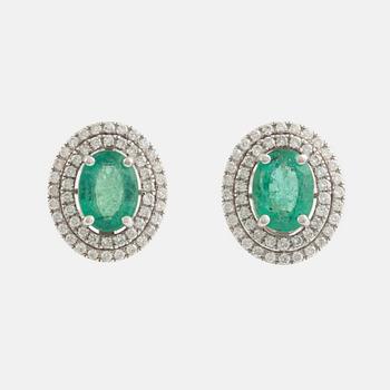 Emerald and brilliant cut diamond earrings.