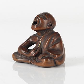 Netsuke, trä, Japan, signerad Gyokkō, 1800-talets senare del.