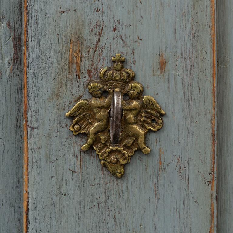 A late 18th century rococo painted cabinet.