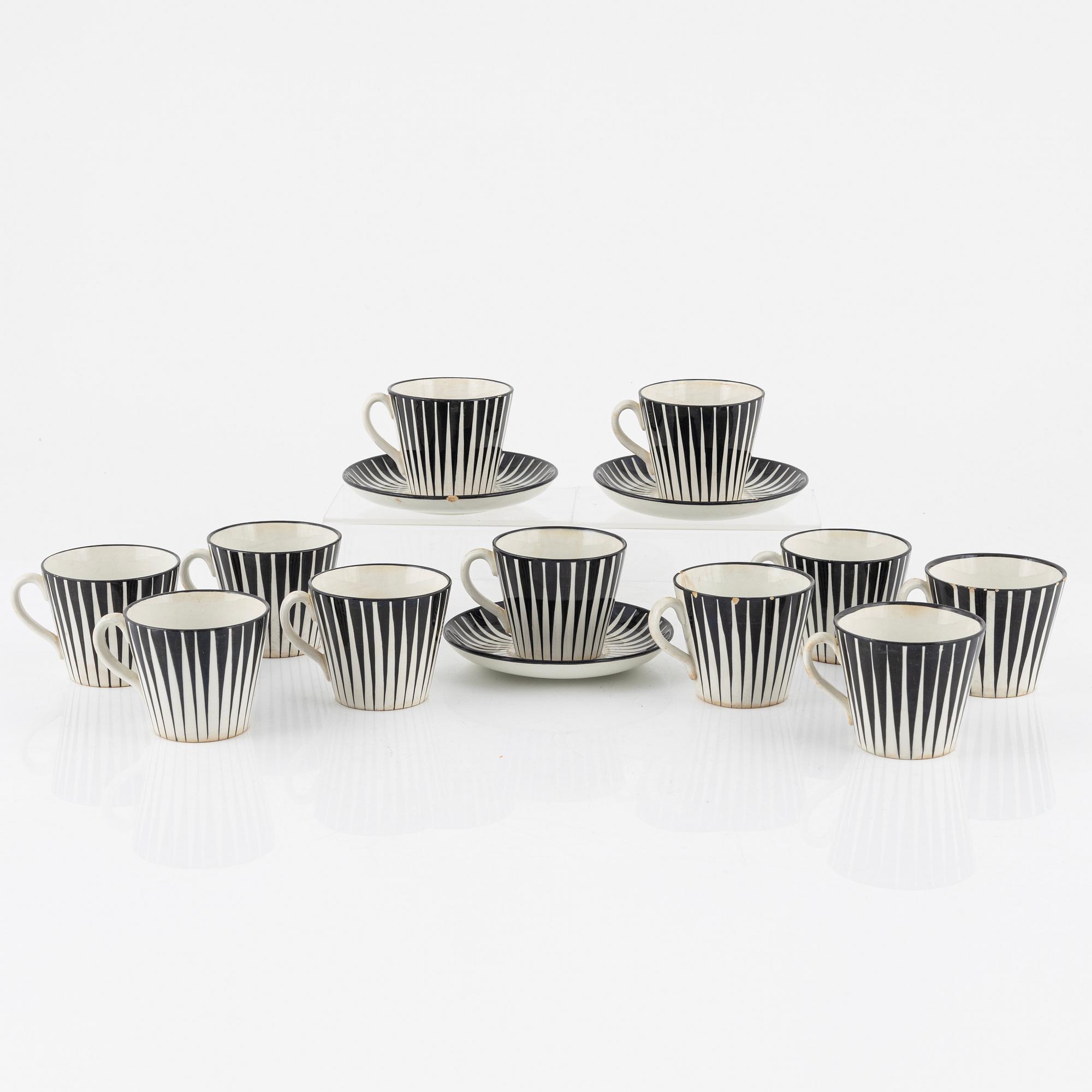 Eugen Trost, eleven coffee cups with three saucers, 'Zebra', Upsala-Ekeby Gefle.