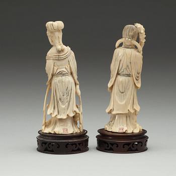 A pair of Chinese ivory figures, early 20th Century.