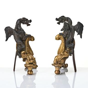 A pair of Rococo style 19th century  gilt and patinated bronze dragon chenets.