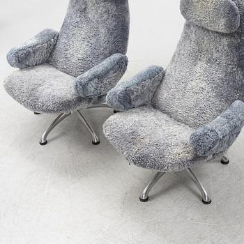 Alf Svensson, a pair of "Contourett Roto" easy chairs for Dux, Sweden.