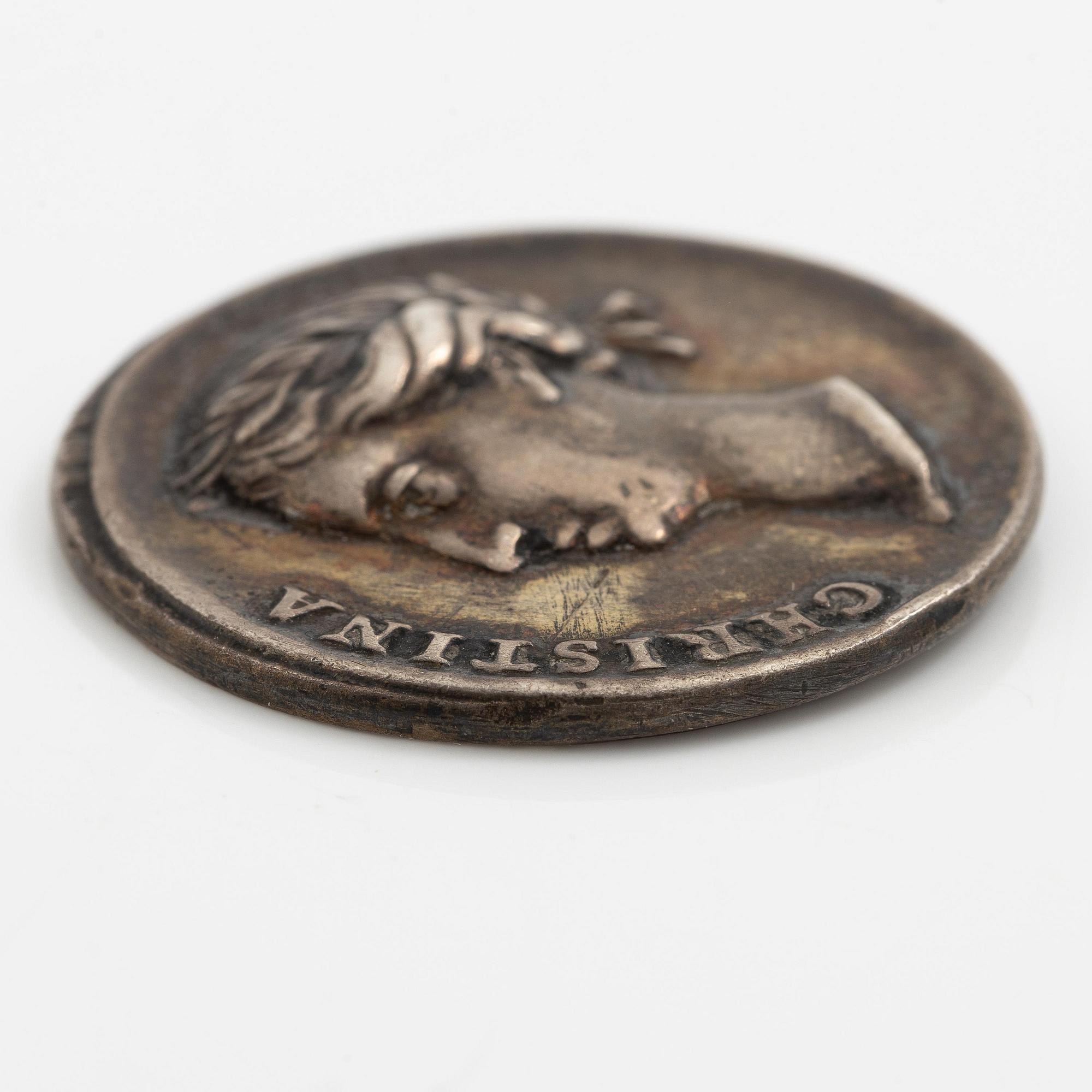 A coin commemorating Christina of Sweden's coronation 1650, by Erich Parise (medal engraver, fl. mid 17th century).