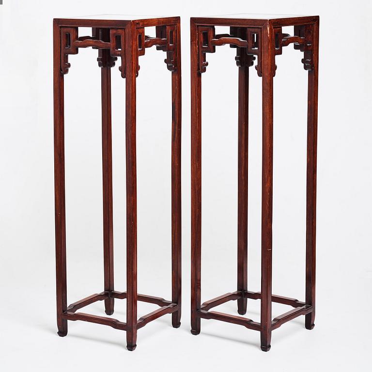 A pair of Chinese pidestals, 20th Century.