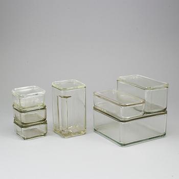 WILHELM WAGENFELD, six 'Kubus' glass containers and a jug