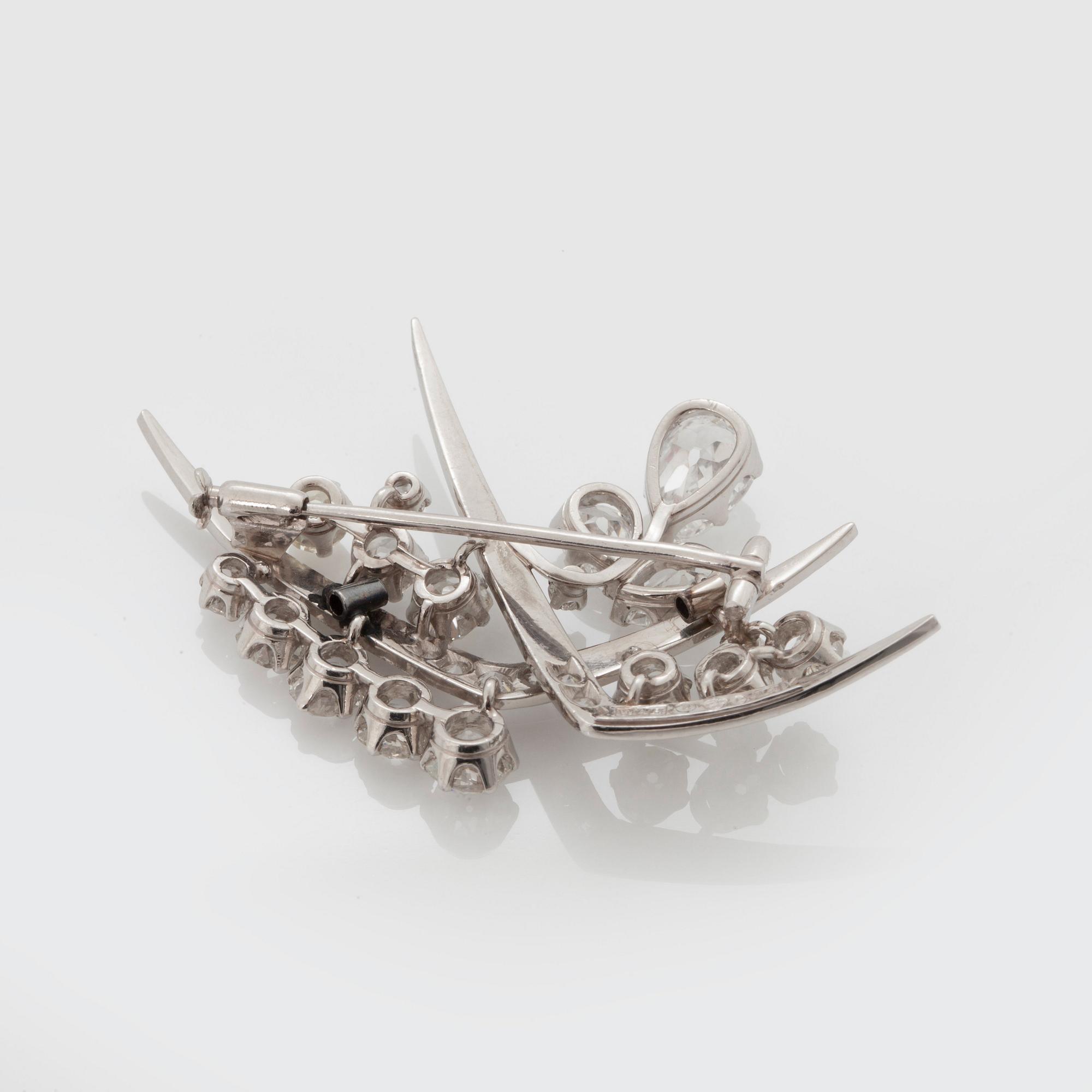 A TIARA with cultured pearls and a detachable brooch set with old-cut diamonds.