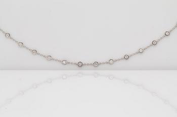 A btilliant cut diamond necklace. Total carat weight circa 4.95 cts. Quality circa H/SI.