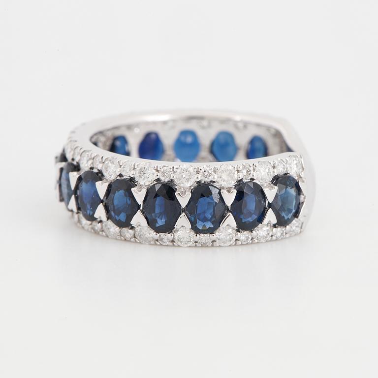 Oval sapphire and brilliant-cut diamond ring.