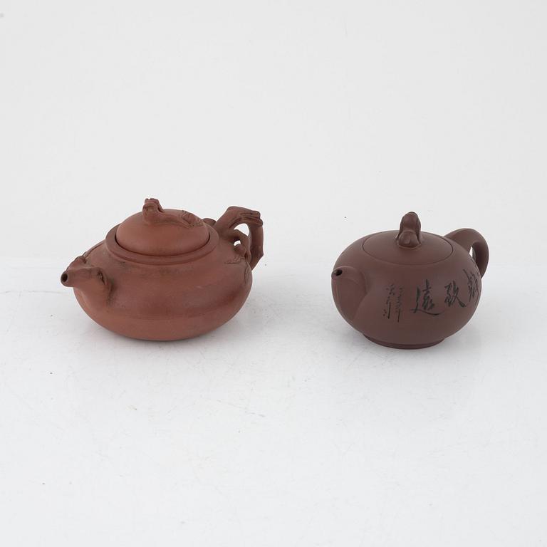 Two Yixing teapots, China, 20th century.