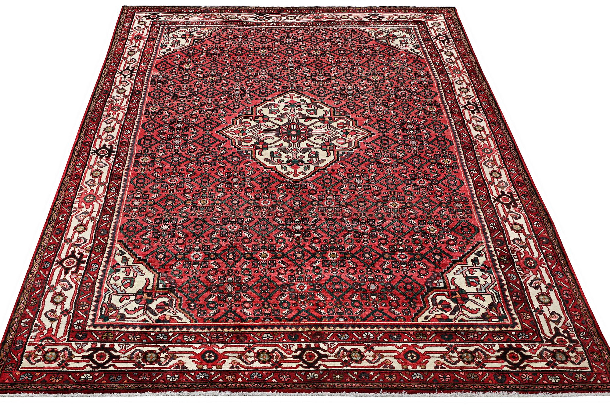 A Hosseinabad carpet, c. 310 x 210 cm.