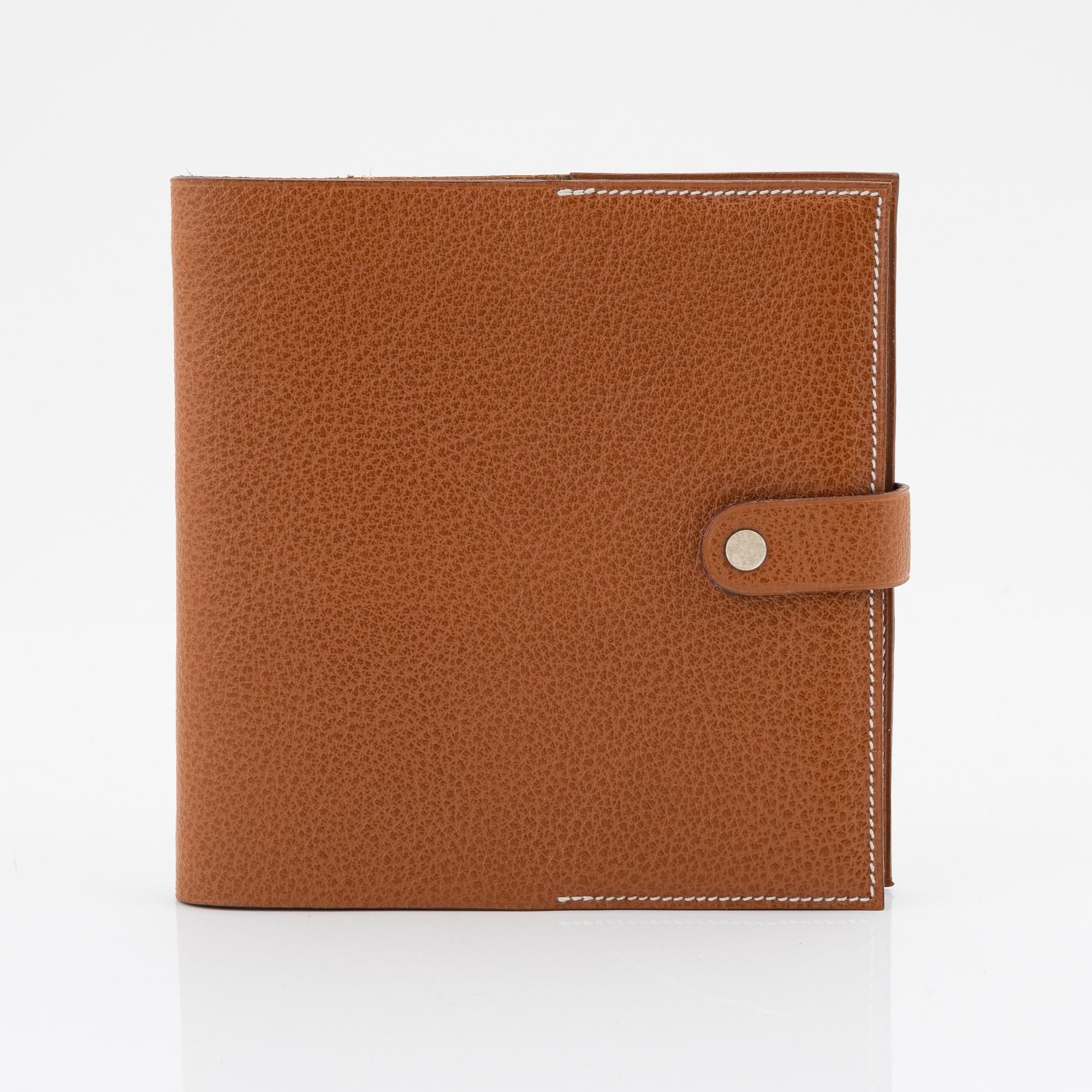 Hermès, a whisky leather notebook/agenda.