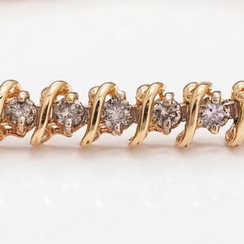A 14K gold bracelet with light brown diamonds ca. 2.38 ct in total.