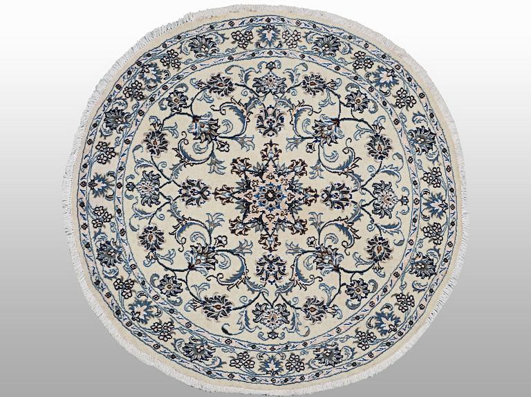 A rug, Nain, part silk, ca 146 x 146 cm.